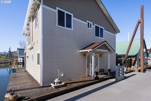 18989 NE Marine Dr Unit 44, Portland, OR 97230 - rear view of property with a deck with water view