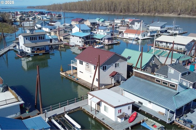 aerial view featuring a residential view and a water view