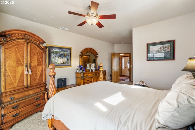 18989 NE Marine Dr Unit 44, Portland, OR 97230 - carpeted bedroom with a ceiling fan