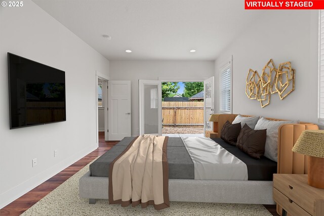 427 NW Garibaldi St, Hillsboro, OR 97124 - bedroom featuring recessed lighting, wood finished floors, baseboards, and access to exterior
