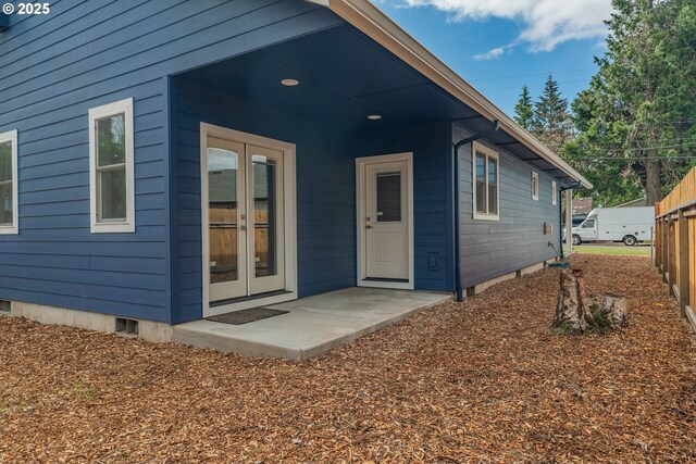 427 NW Garibaldi St, Hillsboro, OR 97124 - doorway to property featuring crawl space and french doors