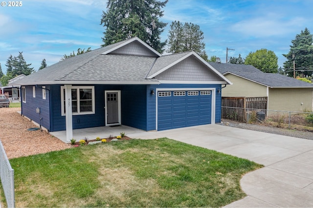 427 NW Garibaldi St, Hillsboro, OR 97124 - ranch-style home with a garage, roof with shingles, driveway, and a porch