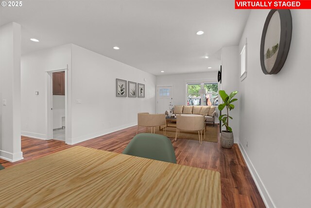 427 NW Garibaldi St, Hillsboro, OR 97124 - living area featuring wood finished floors, recessed lighting, and baseboards