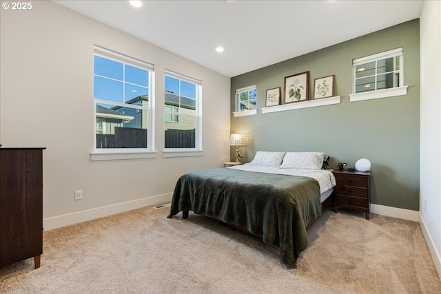 bedroom with carpet floors, recessed lighting, and baseboards