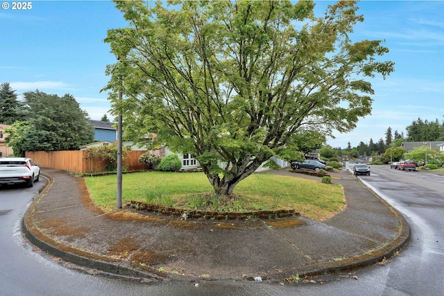view of property hidden behind natural elements