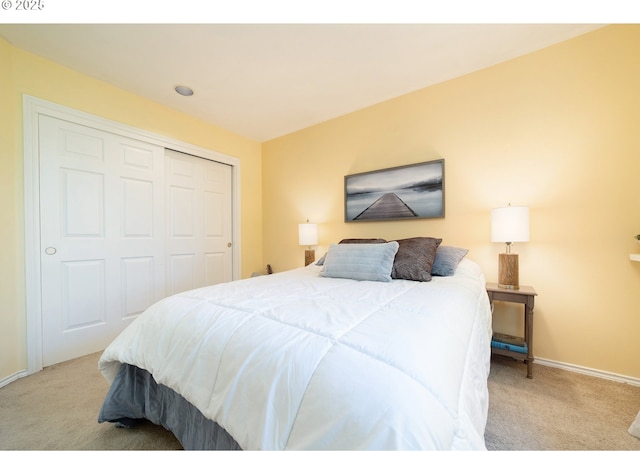 3540 S Corbett Ave, Portland, OR 97239 - bedroom featuring carpet, a closet, and baseboards