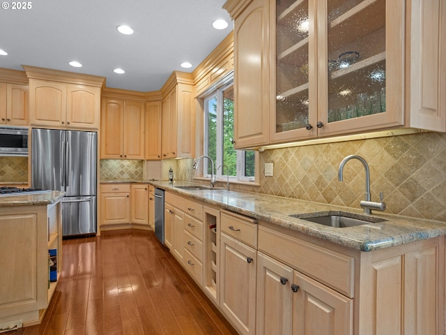 8801 SE Walnut Dr, Amity, OR 97101 - kitchen featuring appliances with stainless steel finishes, light brown cabinets, a sink, light stone counters, and recessed lighting