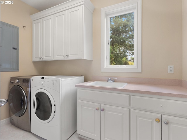 8801 SE Walnut Dr, Amity, OR 97101 - washroom featuring cabinet space, electric panel, and washer and clothes dryer