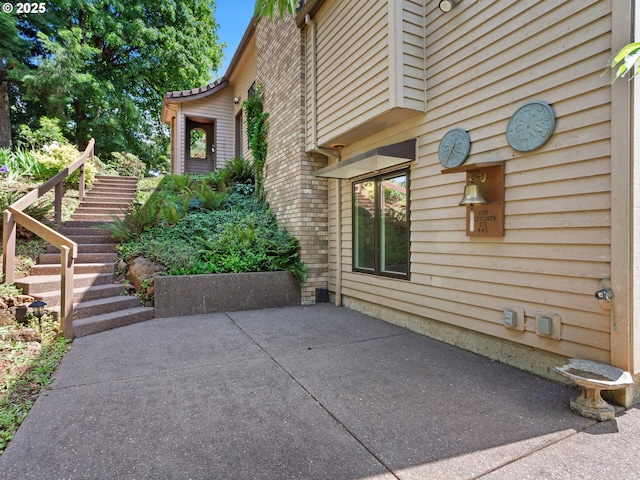8801 SE Walnut Dr, Amity, OR 97101 - view of patio / terrace featuring stairway