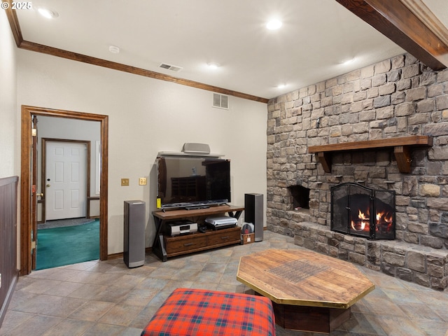 8801 SE Walnut Dr, Amity, OR 97101 - living room with ornamental molding, a stone fireplace, stone finish flooring, and baseboards