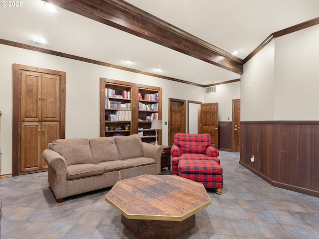 8801 SE Walnut Dr, Amity, OR 97101 - living room with ornamental molding, wooden walls, stone finish flooring, and beamed ceiling