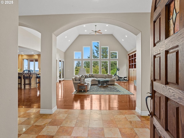 8801 SE Walnut Dr, Amity, OR 97101 - foyer entrance with recessed lighting, a ceiling fan, high vaulted ceiling, arched walkways, and baseboards
