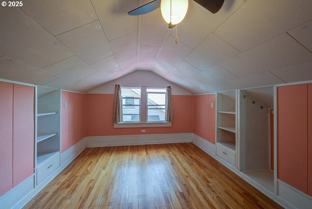 6115 SE 19th Ave, Portland, OR 97202 - additional living space with hardwood / wood-style flooring, built in features, lofted ceiling, and ceiling fan