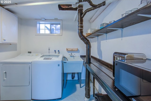 6115 SE 19th Ave, Portland, OR 97202 - washroom featuring cabinet space and washer and clothes dryer