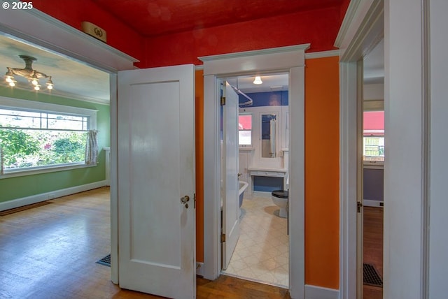 6115 SE 19th Ave, Portland, OR 97202 - corridor with plenty of natural light and ornamental molding