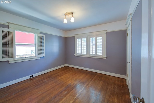 6115 SE 19th Ave, Portland, OR 97202 - spare room featuring wood finished floors and baseboards