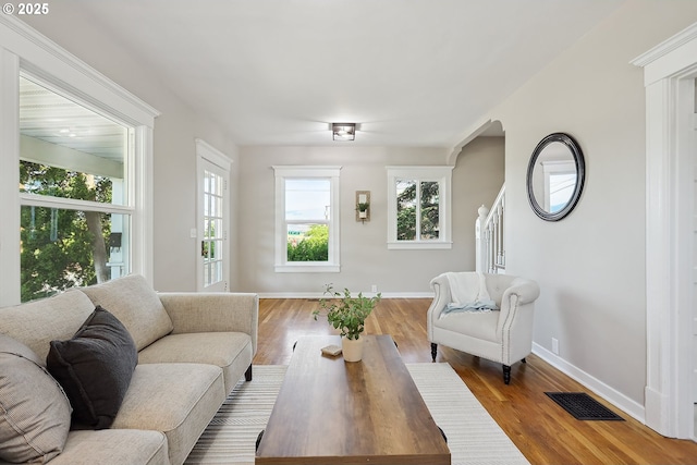 900 H St, The Dalles, OR 97058 - living room featuring baseboards and wood finished floors