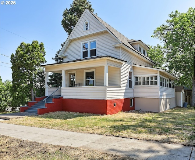 900 H St, The Dalles, OR 97058 - view of front of property with covered porch and a front lawn