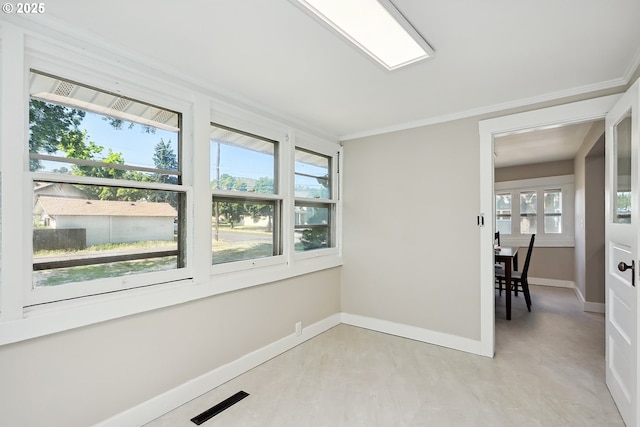 900 H St, The Dalles, OR 97058 - spare room featuring baseboards and ornamental molding