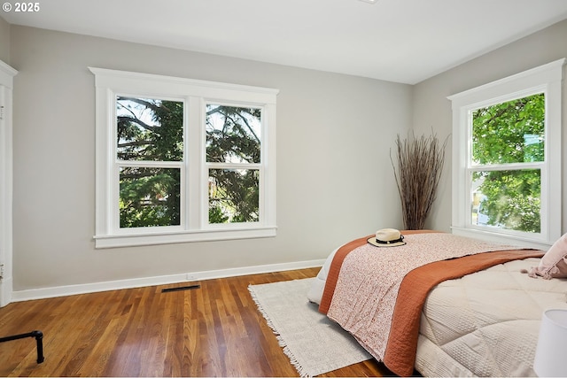 900 H St, The Dalles, OR 97058 - bedroom with baseboards and wood finished floors