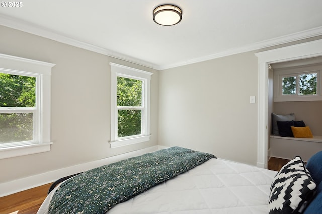 900 H St, The Dalles, OR 97058 - bedroom with wood finished floors and ornamental molding