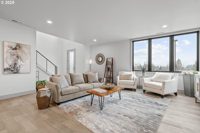 living room with light hardwood / wood-style floors