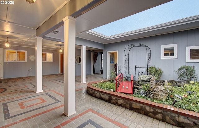 view of patio with visible vents