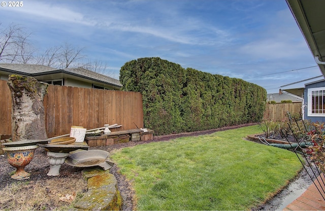 view of yard with fence