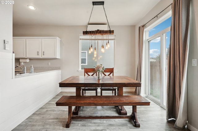 dining room featuring recessed lighting and wood finished floors