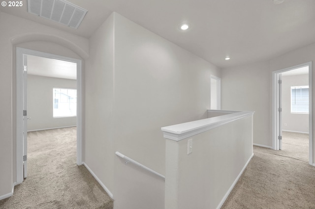 5298 Wales Dr, Eugene, OR 97402 - corridor featuring light colored carpet, an upstairs landing, recessed lighting, and visible vents