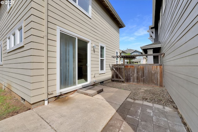 5298 Wales Dr, Eugene, OR 97402 - view of side of property with a patio, a gate, and fence