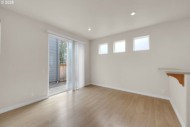 5298 Wales Dr, Eugene, OR 97402 - spare room with light wood-style floors, recessed lighting, and baseboards