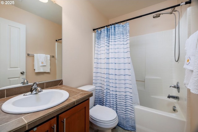 bathroom featuring toilet, shower / tub combo with curtain, and vanity
