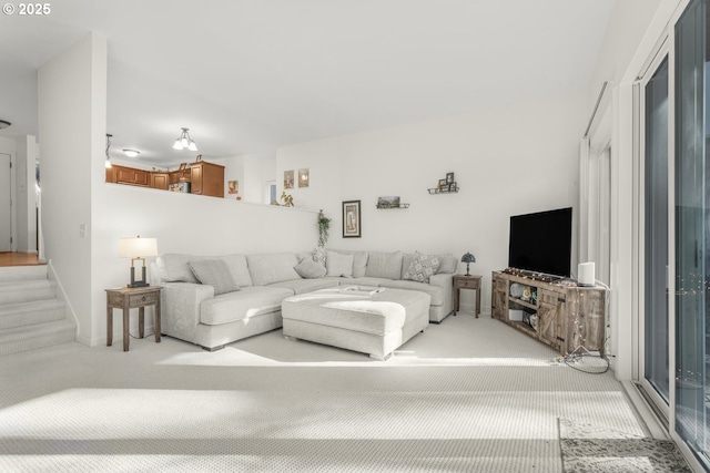 living room featuring light colored carpet