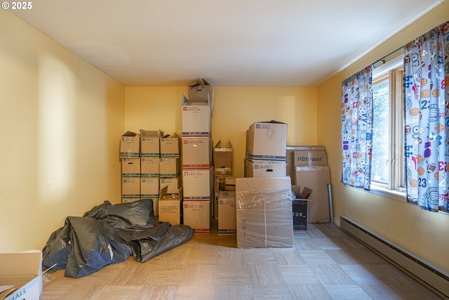 storage room featuring a baseboard radiator