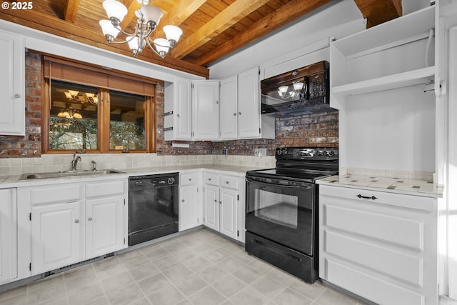 kitchen with beam ceiling, white cabinets, backsplash, and black appliances