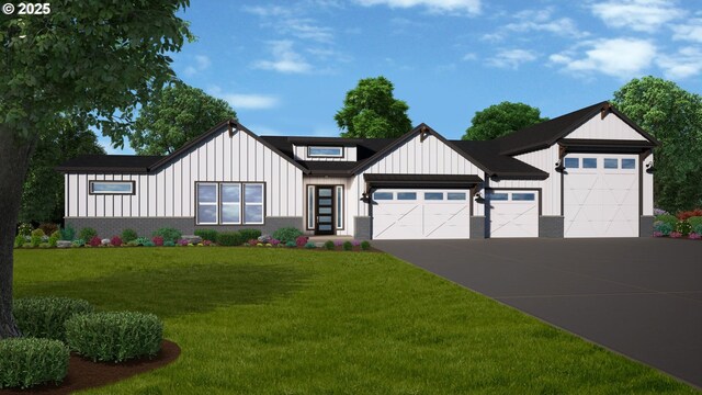 modern inspired farmhouse with a garage and a front lawn