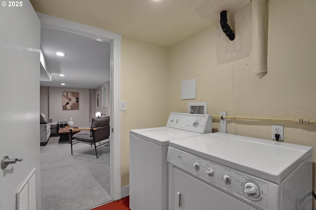 laundry room featuring recessed lighting, laundry area, dark colored carpet, visible vents, and washer and clothes dryer