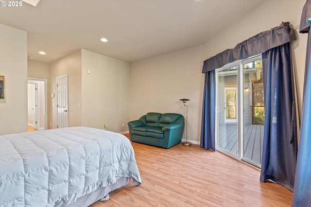 5220 SW Neal Ave, Waldport, OR 97394 - bedroom featuring light wood-style flooring, access to exterior, recessed lighting, and baseboards