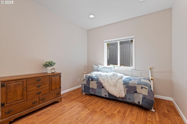 5220 SW Neal Ave, Waldport, OR 97394 - bedroom featuring light wood-style floors, baseboards, and recessed lighting