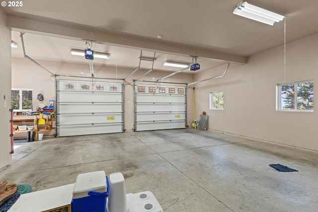 5220 SW Neal Ave, Waldport, OR 97394 - garage featuring a garage door opener