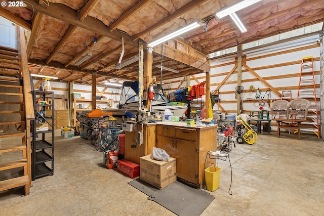 5220 SW Neal Ave, Waldport, OR 97394 - garage with a workshop area