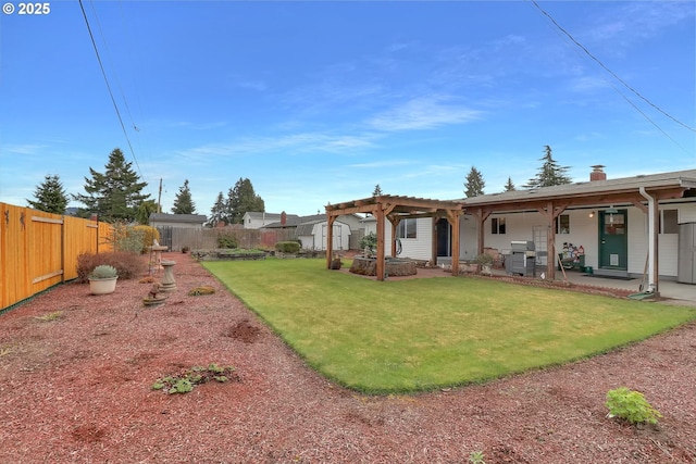 view of yard featuring a patio, a fenced backyard, and a pergola