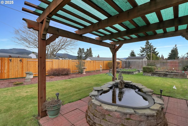 view of patio / terrace with a pergola and a fenced backyard