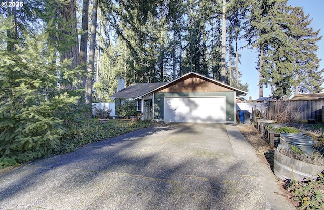 view of front of property with a garage