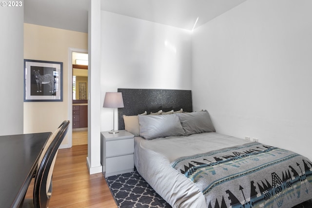 1025 NW Couch St Unit 613, Portland, OR 97209 - bedroom featuring wood finished floors