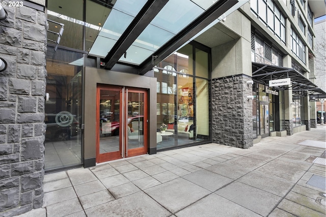 1025 NW Couch St Unit 613, Portland, OR 97209 - view of exterior entry with stone siding