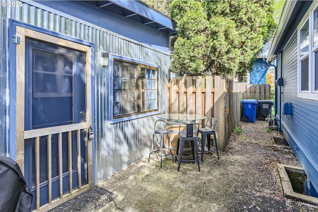 view of patio / terrace with fence