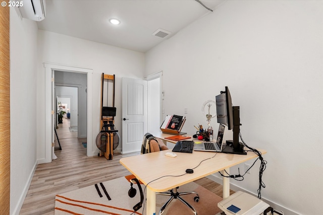 1905 2nd St, Baker City, OR 97814 - office area featuring light wood-style flooring, baseboards, a wall mounted air conditioner, and recessed lighting