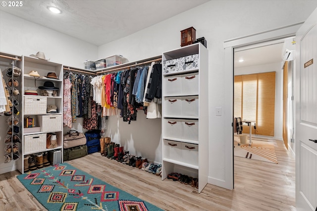 1905 2nd St, Baker City, OR 97814 - walk in closet featuring wood finished floors and an AC wall unit